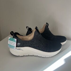 Skechers Women's Black and White Arch Fit Slip-On Sneakers